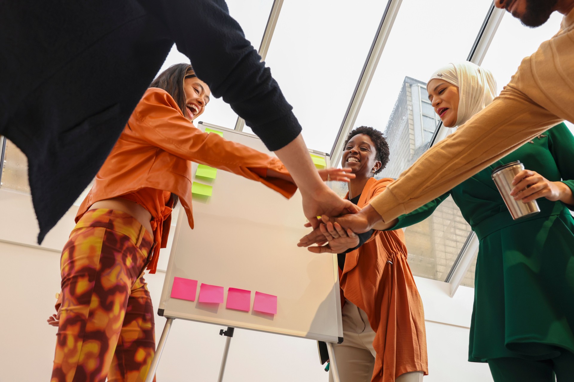Business people joining hands together