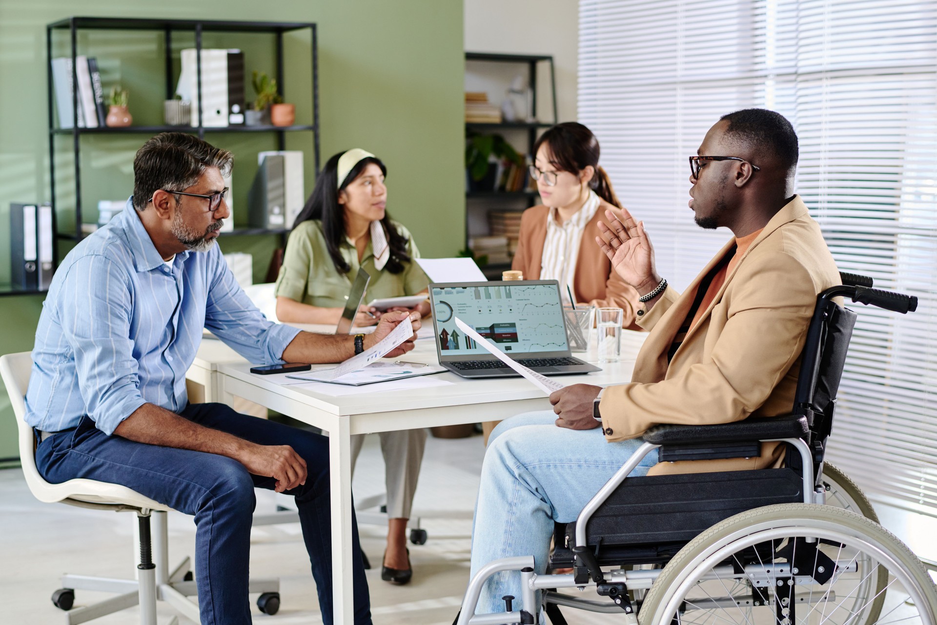 Discussing Business Strategies in Collaborative Meeting Room